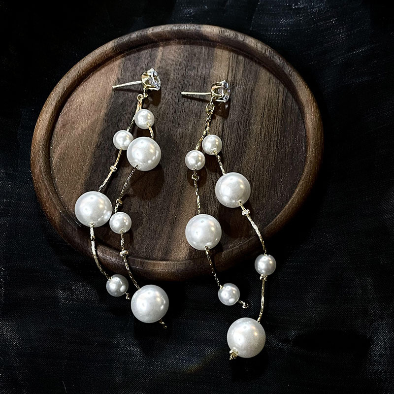 科技與時(shí)尚完美融合，最新長(cháng)款珍珠耳飾款式亮相！